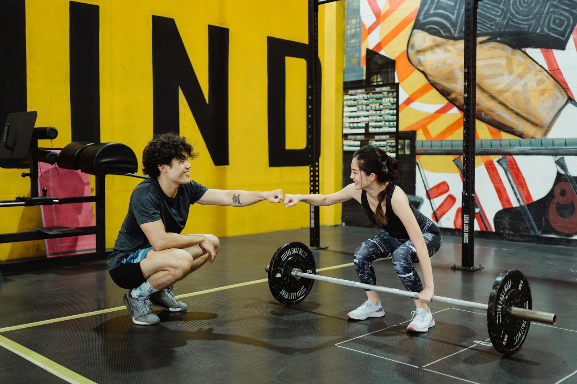 a man and a woman at the gym