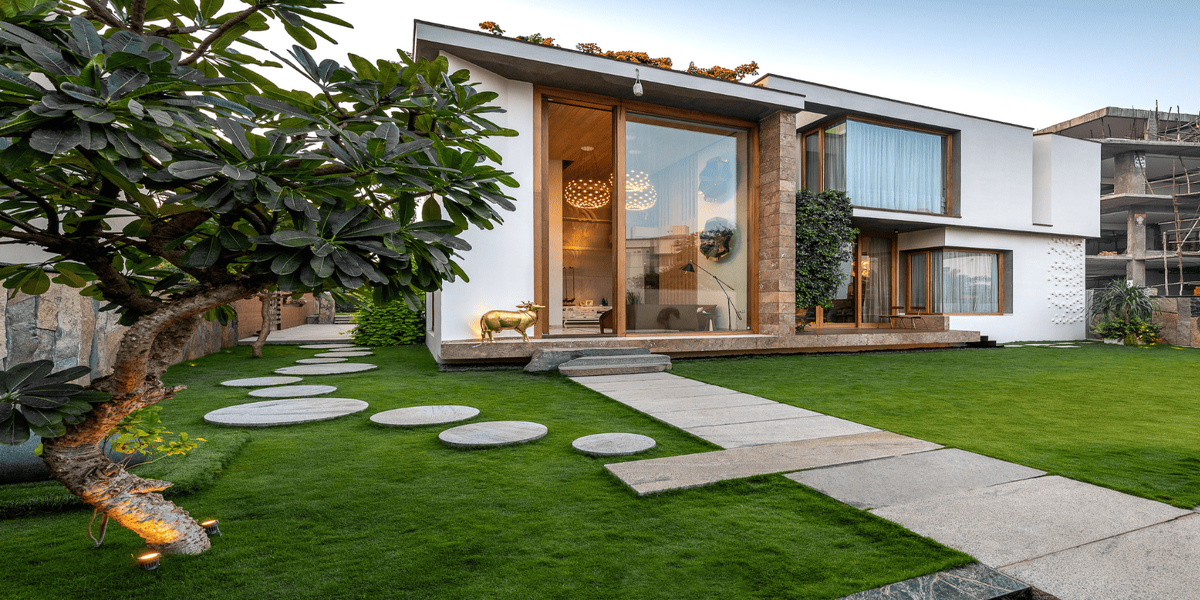 A modern green home designed with smart and sustainable ideas for 2026, featuring energy-efficient appliances, solar panels, natural materials, eco-friendly furniture, indoor plants, water-saving systems, and sustainable home design elements. The concept highlights practical ways to create a comfortable, stylish, and environmentally responsible living space while reducing energy consumption, waste, and environmental impact.
